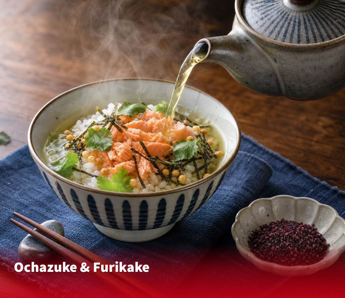 Steaming bowl of Japanese ochazuke with tea being poured, furikake on the side